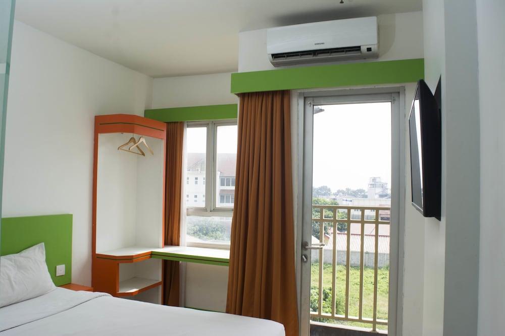 Titanium Express Homtel Hotel Джакарта Екстериор снимка